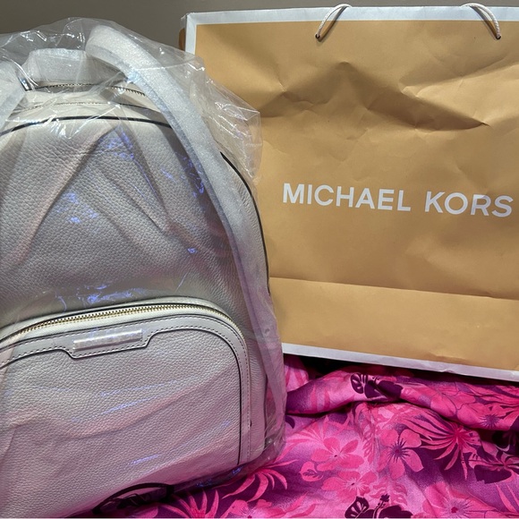 MK backpack $450 reg. $630 coach cross body $200 reg price $345